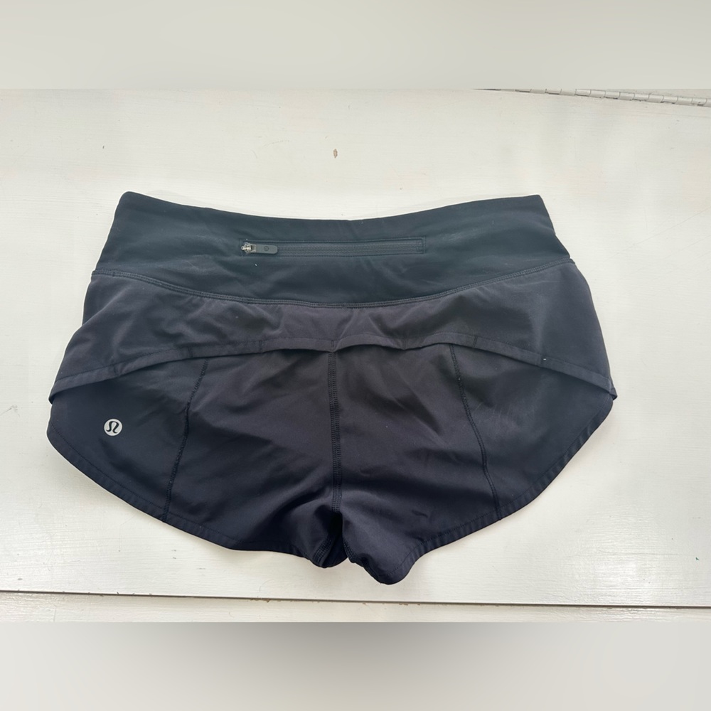 Black Lululemon speed up short. Size 2, great condition.